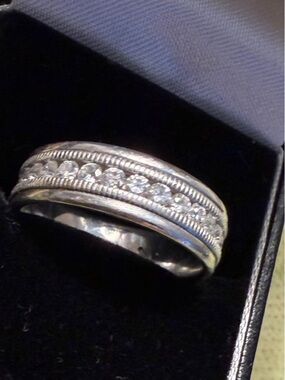 1.45carat Diamond eternity band custom made by me, graded 29 F color VS stones.